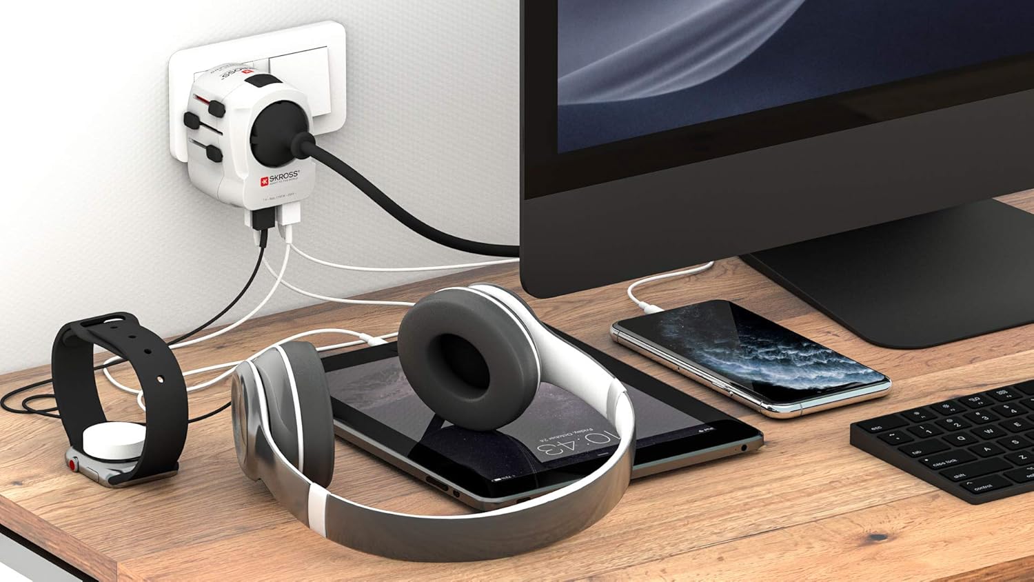 Skross - World Travel Adapter with Ground Plugs (no Swiss & Italy) + 4 USB SLOT 2400 mA White