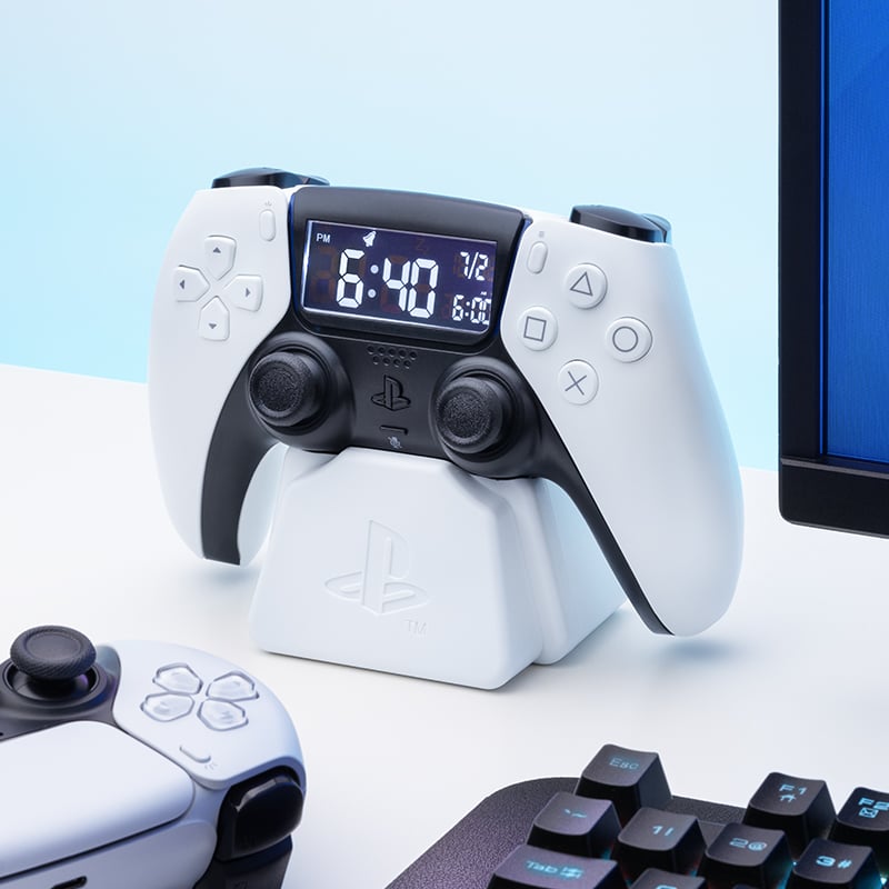 PlayStation - Réveil matin manette blanche de PlayStation 5 - flash vidéo