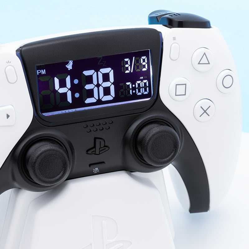 PlayStation - Réveil matin manette blanche de PlayStation 5 - flash vidéo