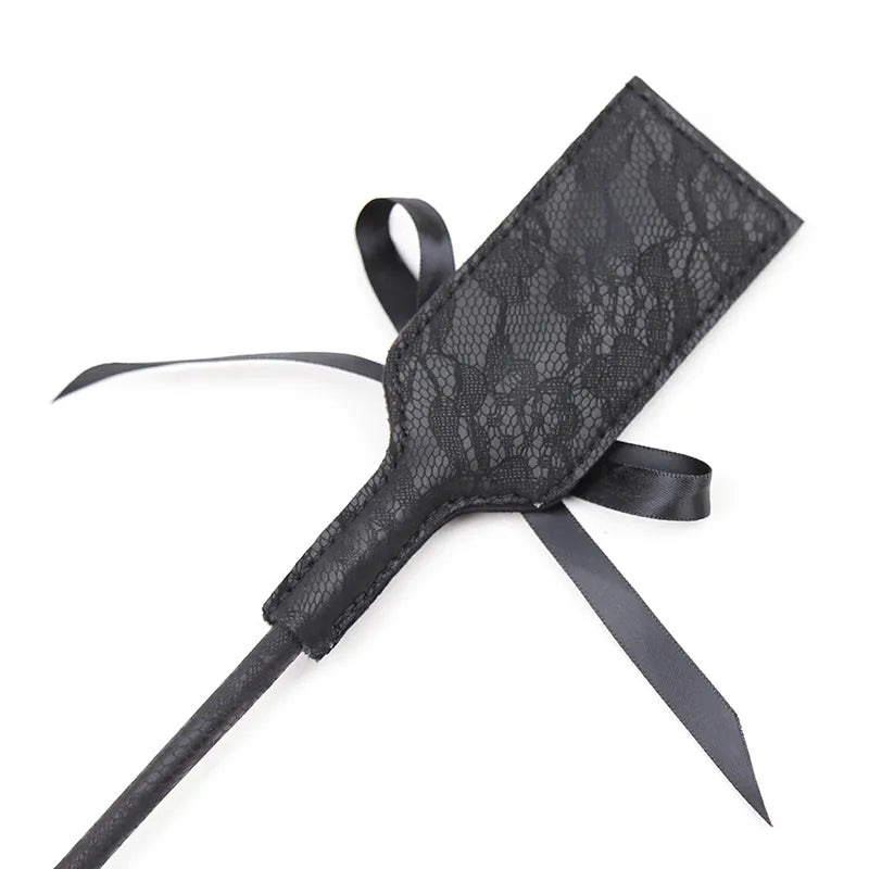 Cravache et plumeau noir - flash vidéo