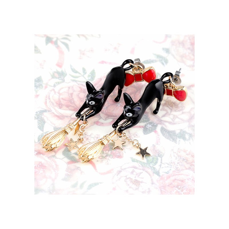 BOUCLES D’OREILLES PERCÉES JIJI SUR SON BALAI - KIKI LA PETITE SORCIÈ