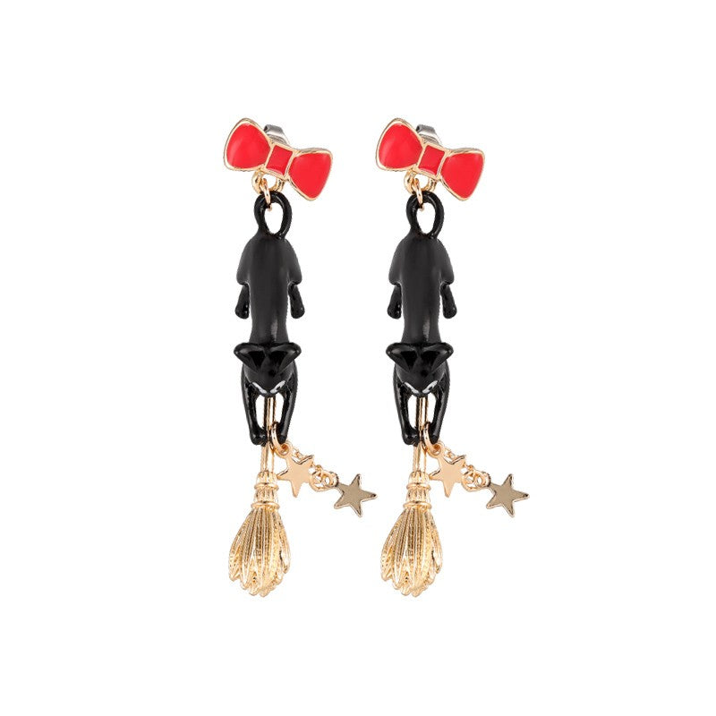 BOUCLES D’OREILLES PERCÉES JIJI SUR SON BALAI - KIKI LA PETITE SORCIÈ
