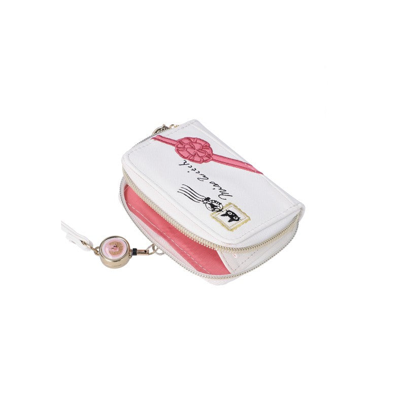 PORTE-MONNAIE LETTRE JIJI AVEC CORDON - KIKI LA PETITE SORCIÈRE