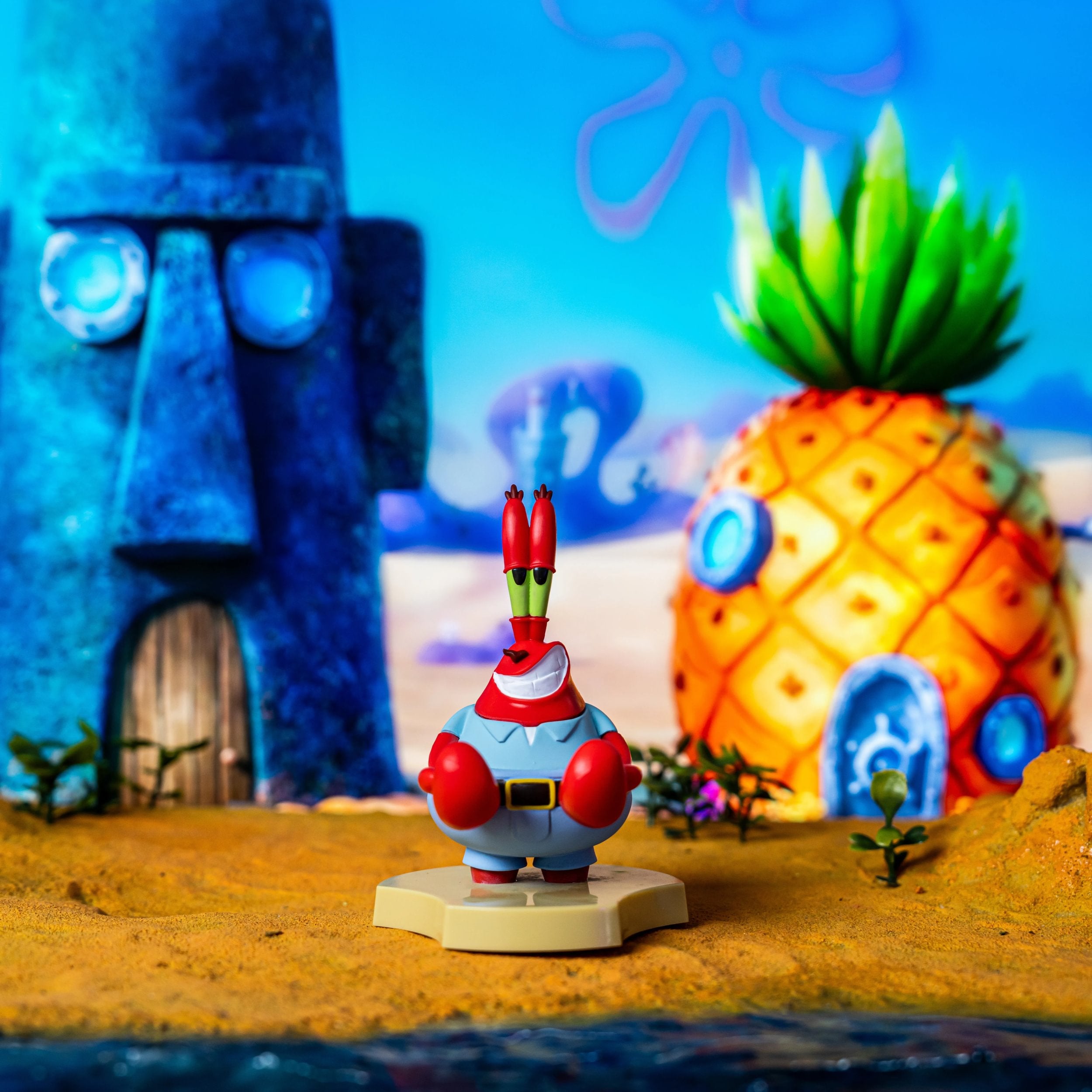 Cable Guys Holdems - Bob l'éponge - Support pour écouteurs et téléphone M. Krabs - flash vidéo