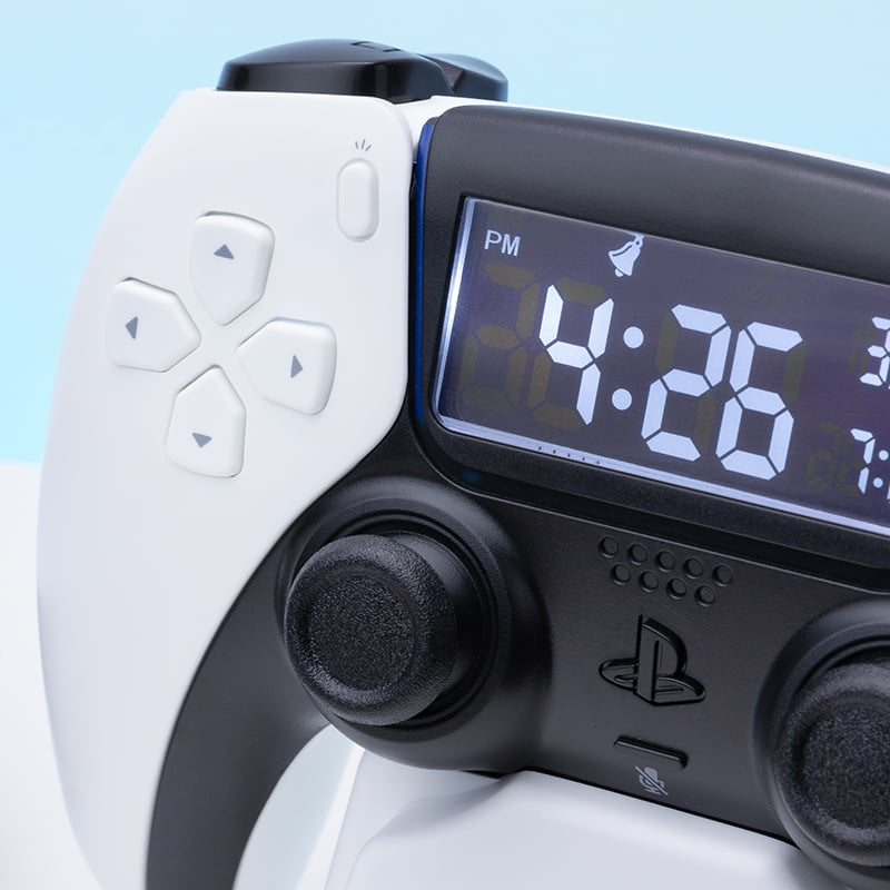 PlayStation - Réveil matin manette blanche de PlayStation 5 - flash vidéo