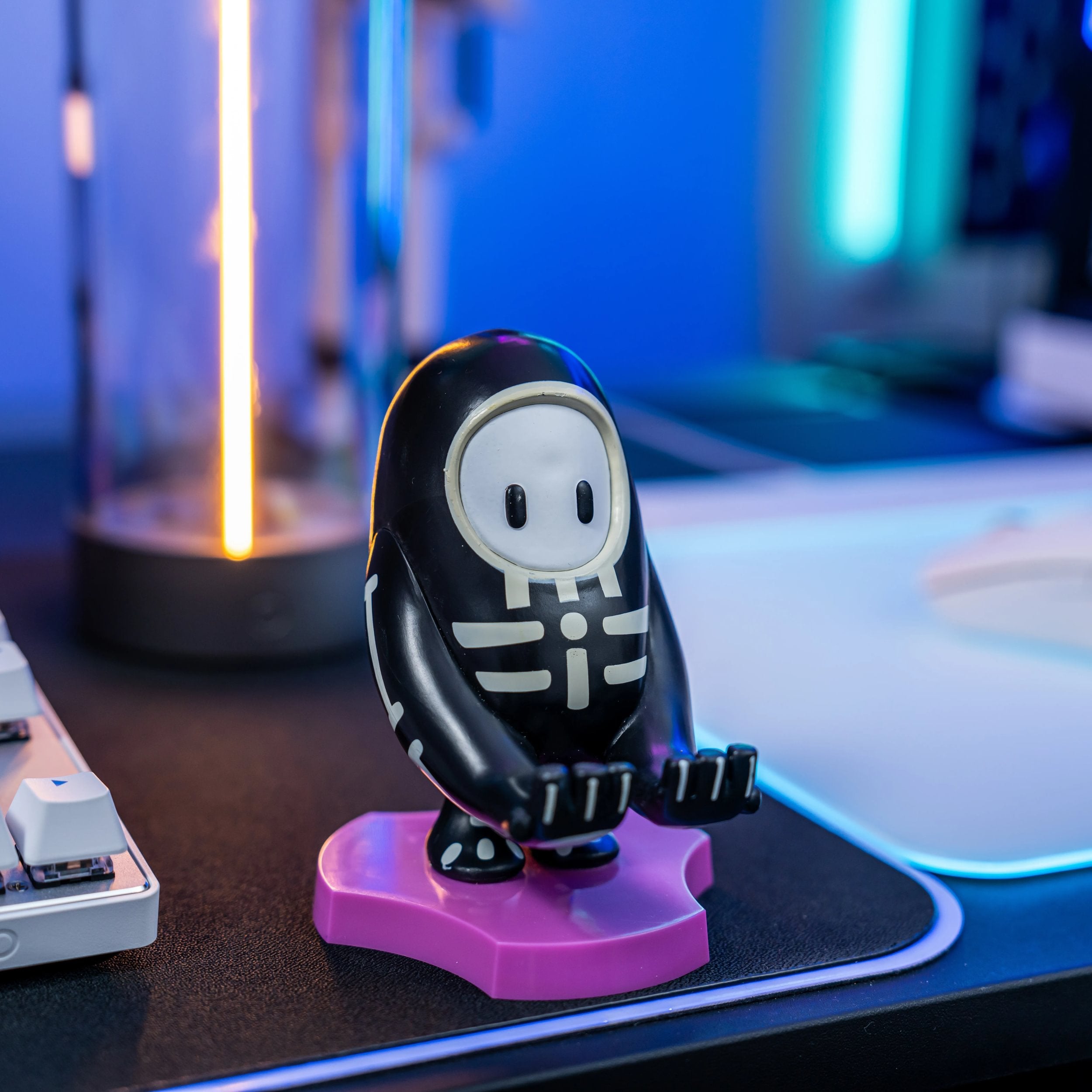 Cable Guys Holdems - Fall Guys - Support pour écouteurs et téléphone Skelly - flash vidéo